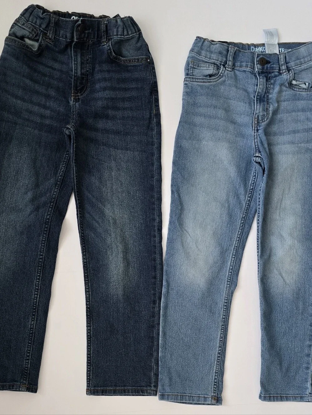 2 Pack. OshKosh B'gosh Kid's Straight Jeans in Light Blue and Dark Blue